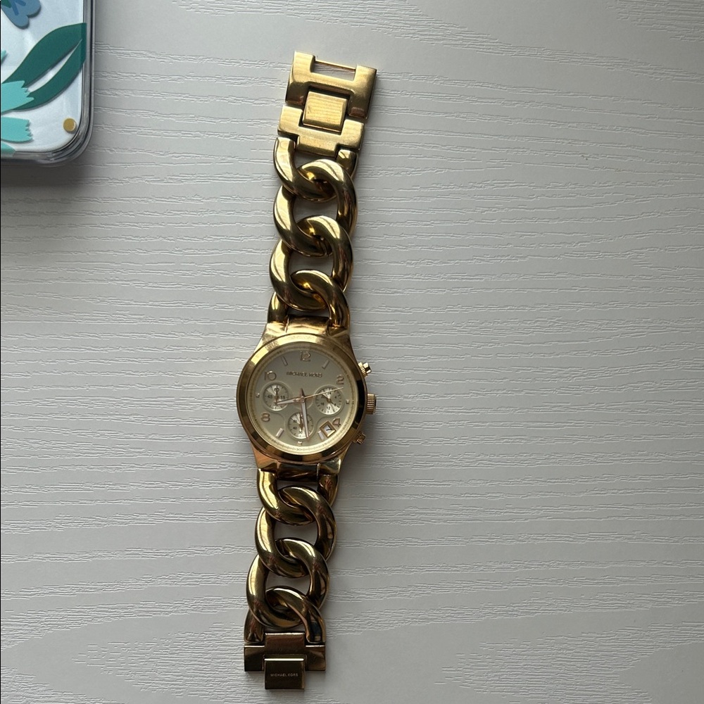 Michael Kors women’s gold watch